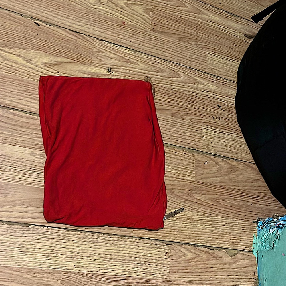It’s an extra small it’s red and it’s from rue 21